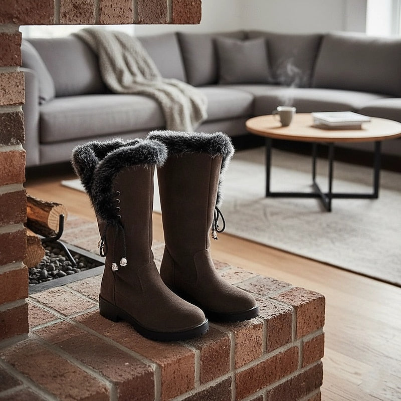 Meredith Women's Knee-High Winter Boots featuring a stylish fur trim, designed for warmth and comfort in cold weather. 9