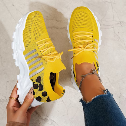 Mica Women’s Sneakers featuring a wide toe box and arch support for enhanced comfort and style. 7
