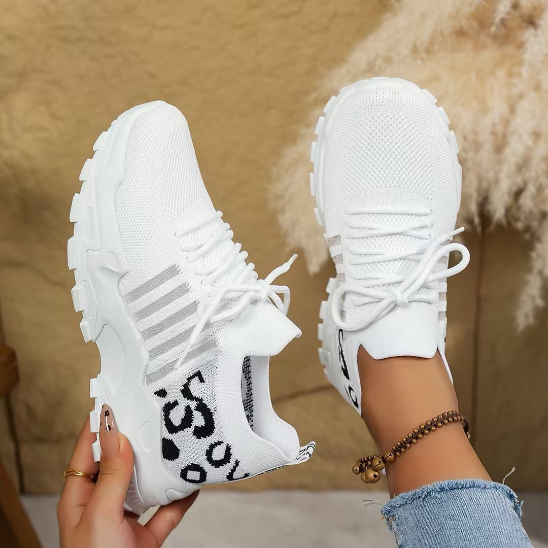 Mica Women’s Sneakers featuring a wide toe box and arch support for enhanced comfort and style. 8