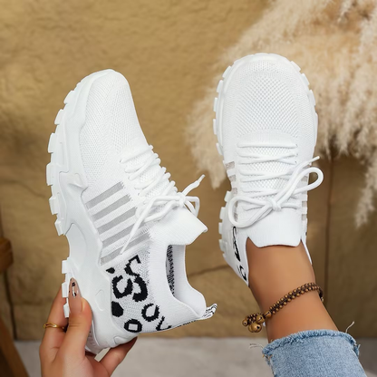 Mica Women’s Sneakers featuring a wide toe box and arch support for enhanced comfort and style. 8