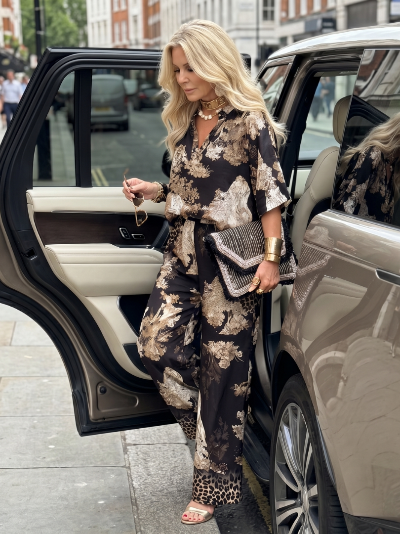 Mina Women’s Two Piece Set featuring a stylish wrap top and wide leg trousers, perfect for casual outings or summer events, showcasing a modern and chic 4