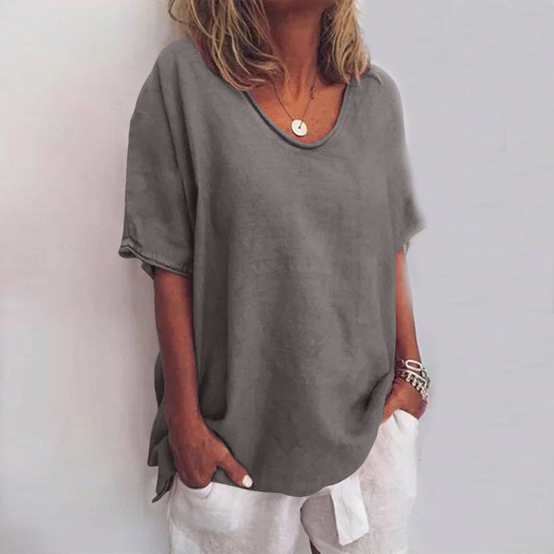 Mira Women’s Blouse featuring a stylish scoop neck and short sleeves, designed in elegant white for a chic and versatile look. 4