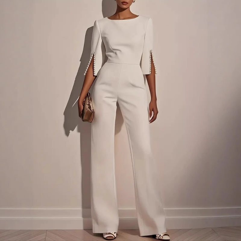 Mira Women's jumpsuit featuring elegant pearl-embellished sleeves and a stylish wide-leg silhouette, perfect for chic occasions. 1