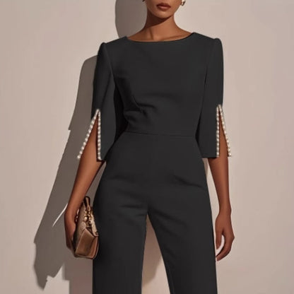 Mira Women's jumpsuit featuring elegant pearl-embellished sleeves and a stylish wide-leg silhouette, perfect for chic occasions. 3