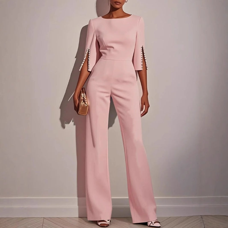 Mira Women's jumpsuit featuring elegant pearl-embellished sleeves and a stylish wide-leg silhouette, perfect for chic occasions. 4