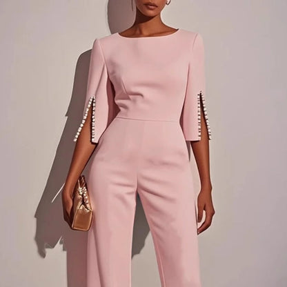 Mira Women's jumpsuit featuring elegant pearl-embellished sleeves and a stylish wide-leg silhouette, perfect for chic occasions. 5