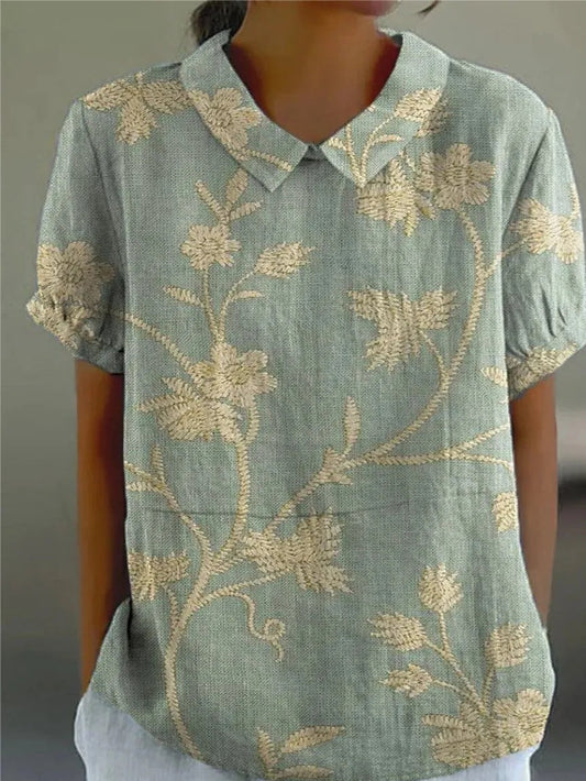 Nova Women's Shirt featuring a relaxed fit and vibrant floral design, perfect for casual outings and spring fashion. 0