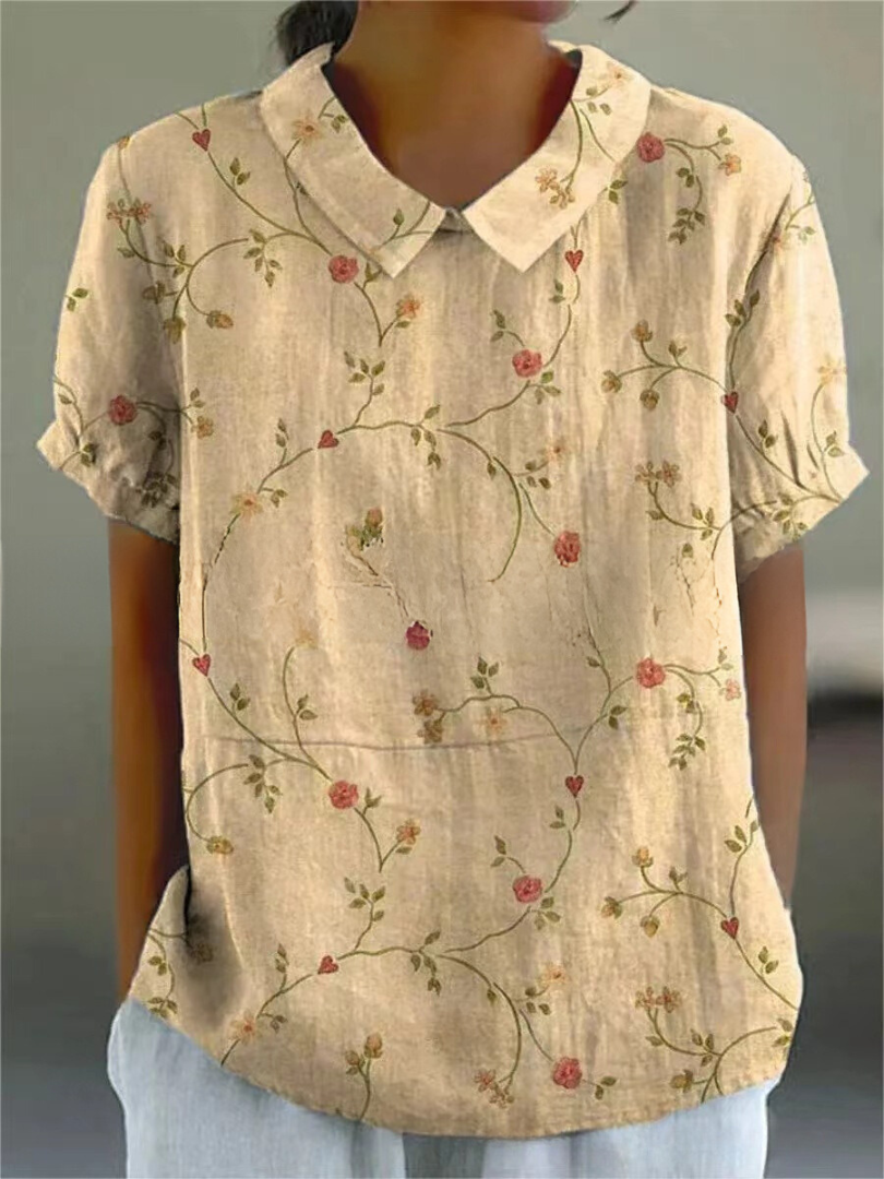 Nova Women's Shirt featuring a relaxed fit and vibrant floral design, perfect for casual outings and spring fashion. 4