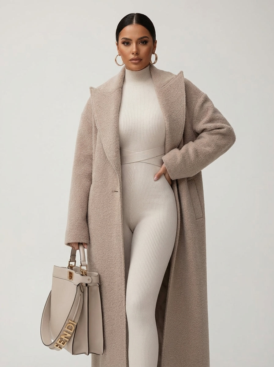 Novara Women’s Long Coat featuring an oversized soft structured fit, perfect for stylish warmth during colder seasons. 1