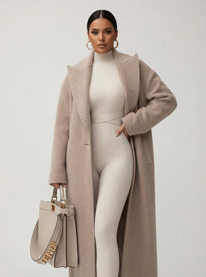Novara Women’s Long Coat featuring an oversized soft structured fit, perfect for stylish warmth during colder seasons. 1
