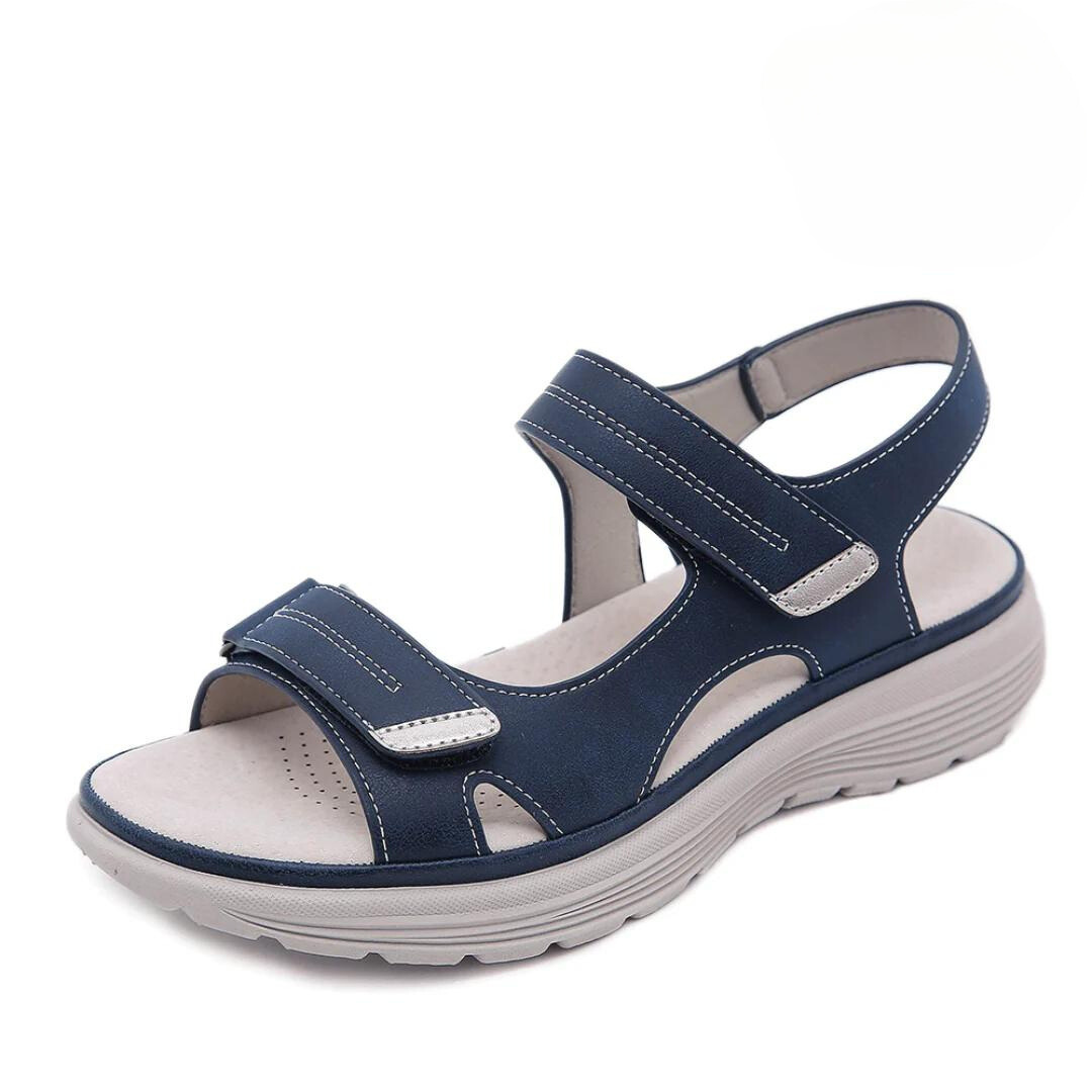 Oasis Women’s Sandals featuring arch support and a cushioned sole, designed for all-day comfort and style. 1