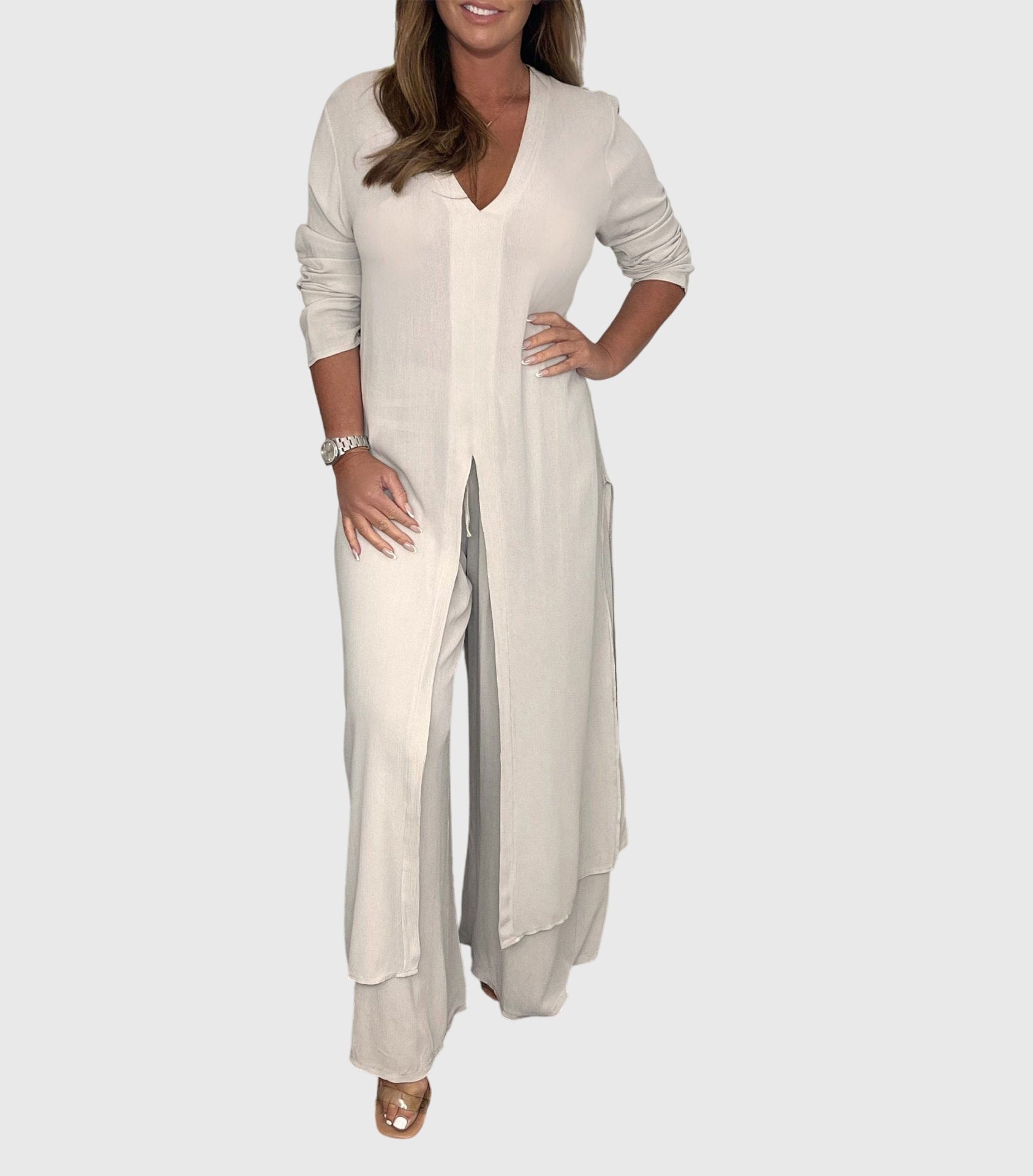 Olive women’s loungewear set featuring wide-leg pants and a long blouse for comfortable and stylish relaxation. 0