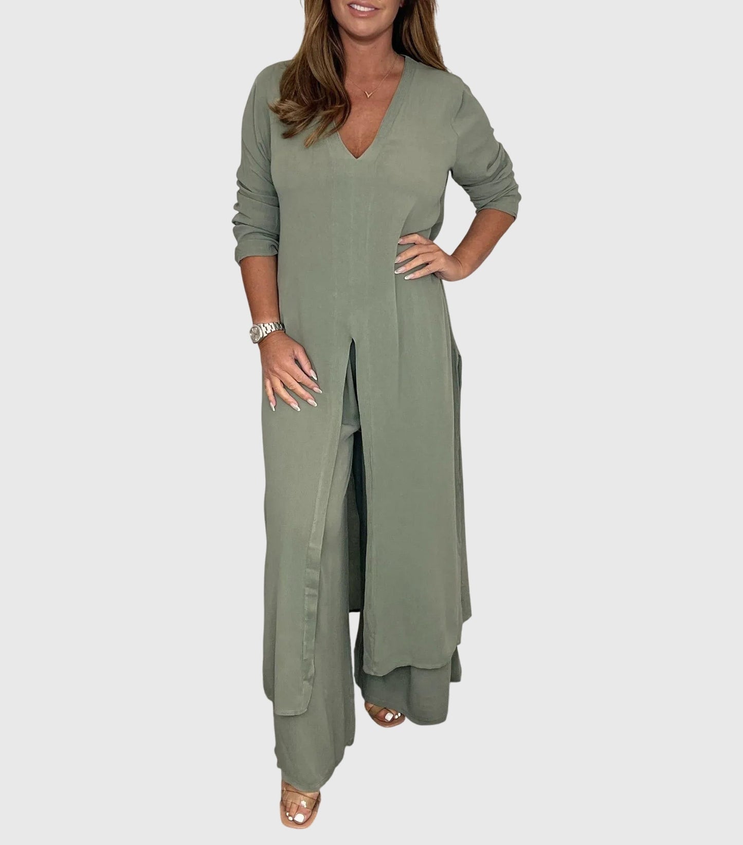 Olive women’s loungewear set featuring wide-leg pants and a long blouse for comfortable and stylish relaxation. 1