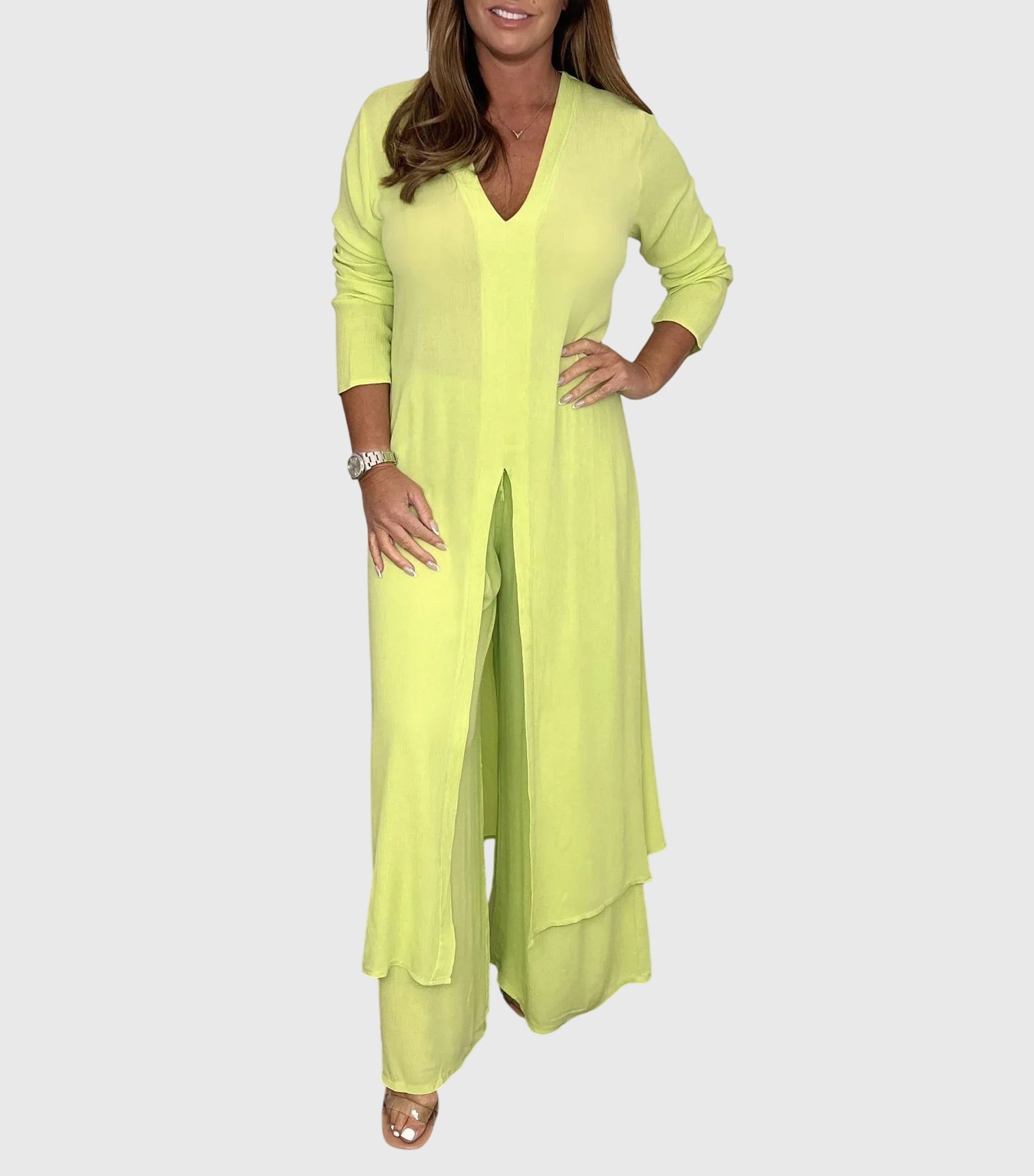 Olive women’s loungewear set featuring wide-leg pants and a long blouse for comfortable and stylish relaxation. 5