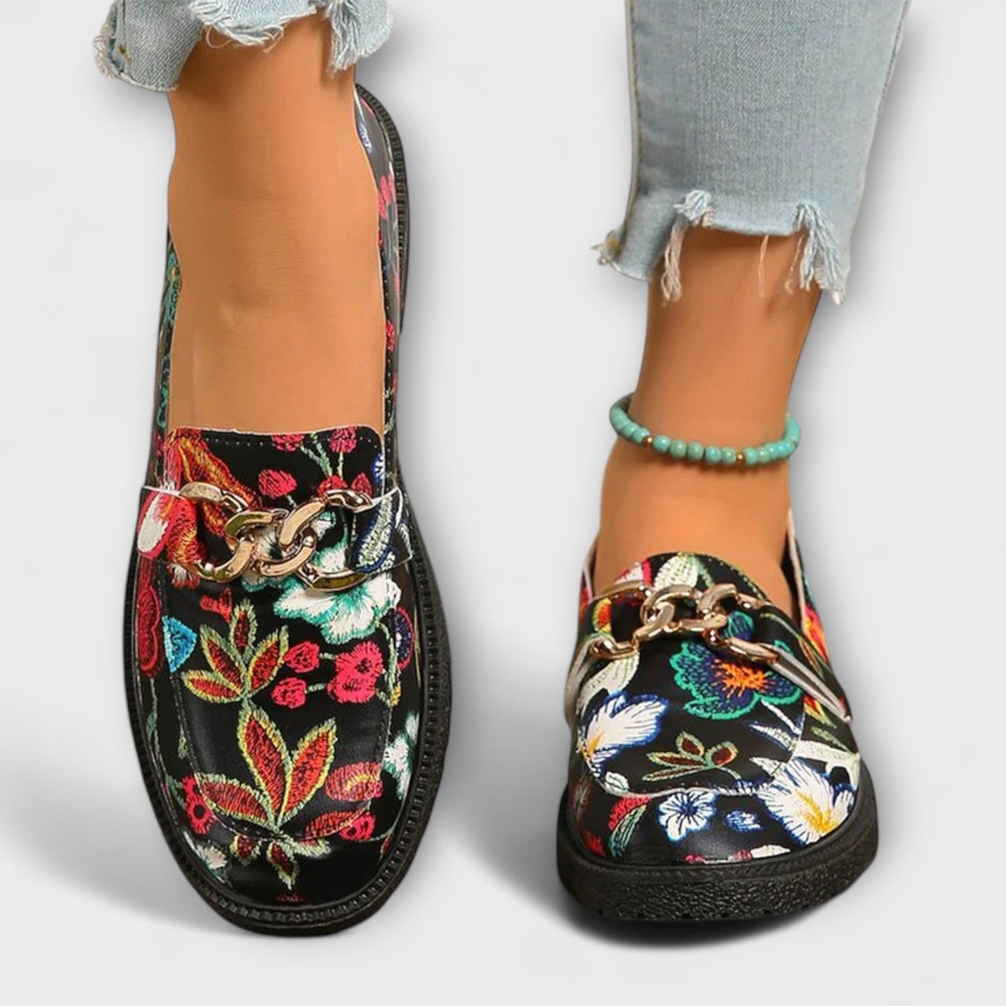 Orlia Women’s Loafers featuring a vibrant multicoloured floral print and a convenient slip-on design, perfect for casual wear. 2