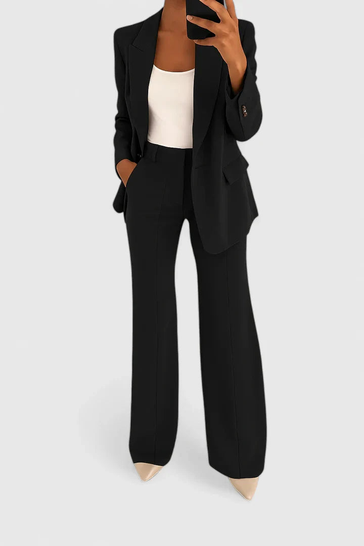 Palynette Women’s Two-Piece Suit Set featuring an elegant silhouette and versatile style, perfect for professional or casual occasions. 1