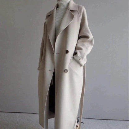 Penelope Women’s Longline Coat featuring premium wool fabric, elegant button closures, and a stylish silhouette, perfect for cold weather and fashionable layering. 0
