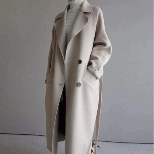 Penelope Women’s Longline Coat featuring premium wool fabric, elegant button closures, and a stylish silhouette, perfect for cold weather and fashionable layering. 0