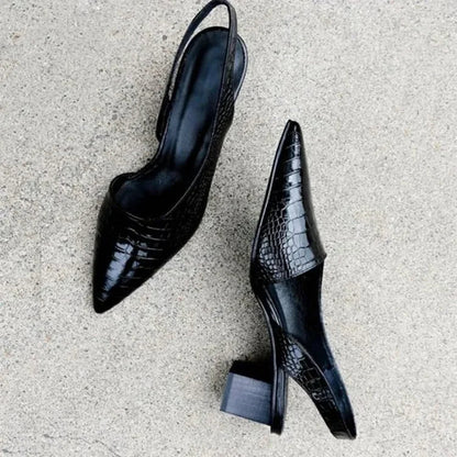 Pura Women's Pumps featuring a stylish pointed toe and an adjustable slingback strap, perfect for elegant occasions and comfortable wear. 1