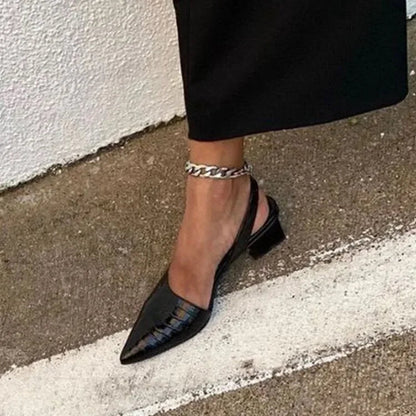 Pura Women's Pumps featuring a stylish pointed toe and an adjustable slingback strap, perfect for elegant occasions and comfortable wear. 2