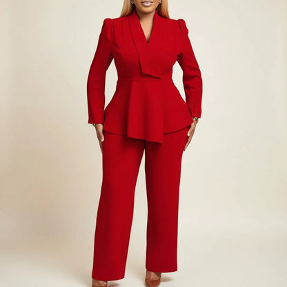 Stylish Pura women's suit featuring a chic peplum blazer and elegant wide-leg pants, perfect for professional and formal occasions. 1