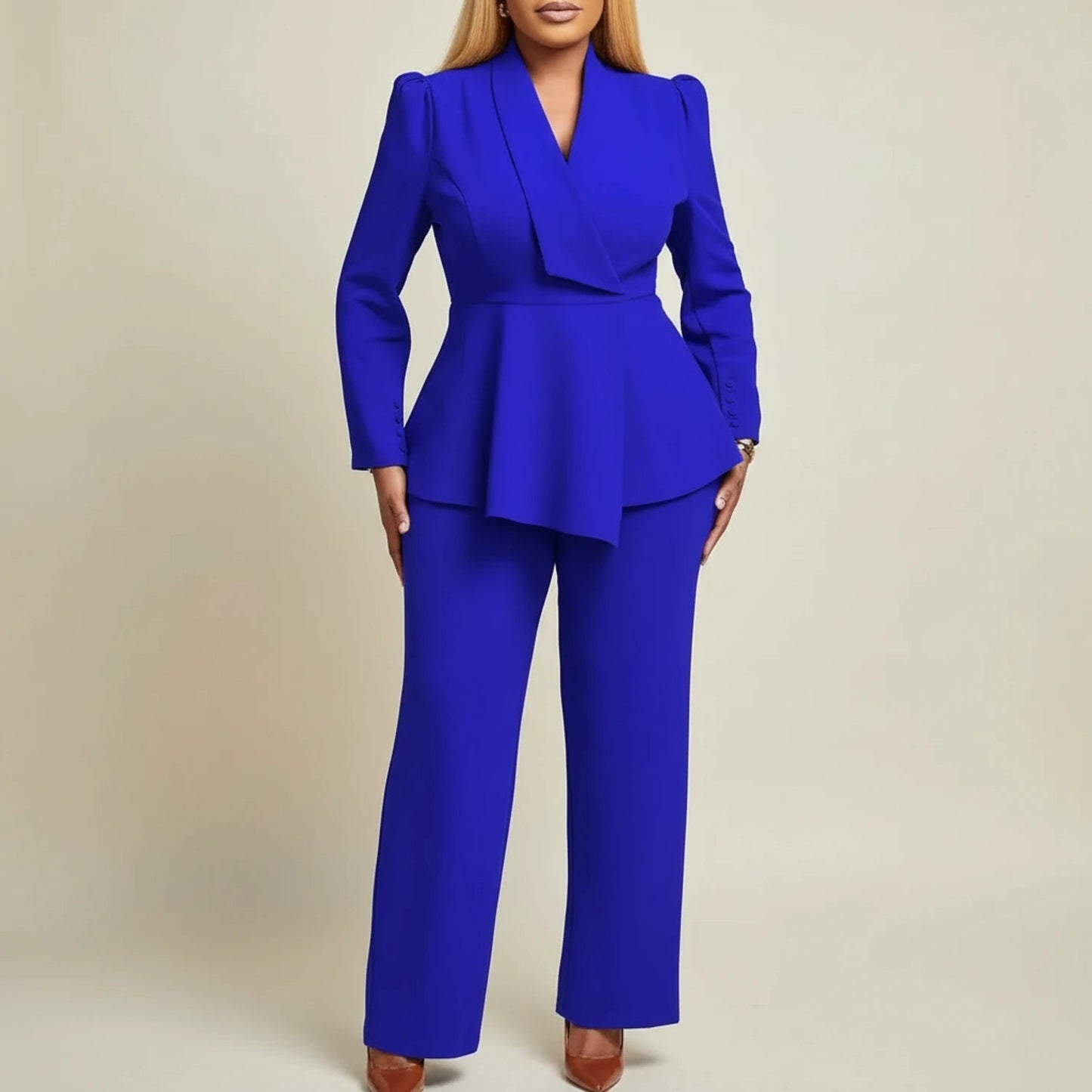 Stylish Pura women's suit featuring a chic peplum blazer and elegant wide-leg pants, perfect for professional and formal occasions. 2