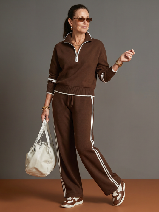 Raven Women's Lounge Set featuring a zip neck long sleeve top and wide leg pants, perfect for comfortable and stylish home wear. 0