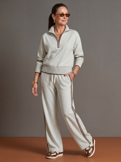 Raven Women's Lounge Set featuring a zip neck long sleeve top and wide leg pants, perfect for comfortable and stylish home wear. 10
