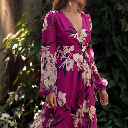 Raya Women’s Dress featuring a flowy fit and vibrant floral design, perfect for stylish summer wear. 2