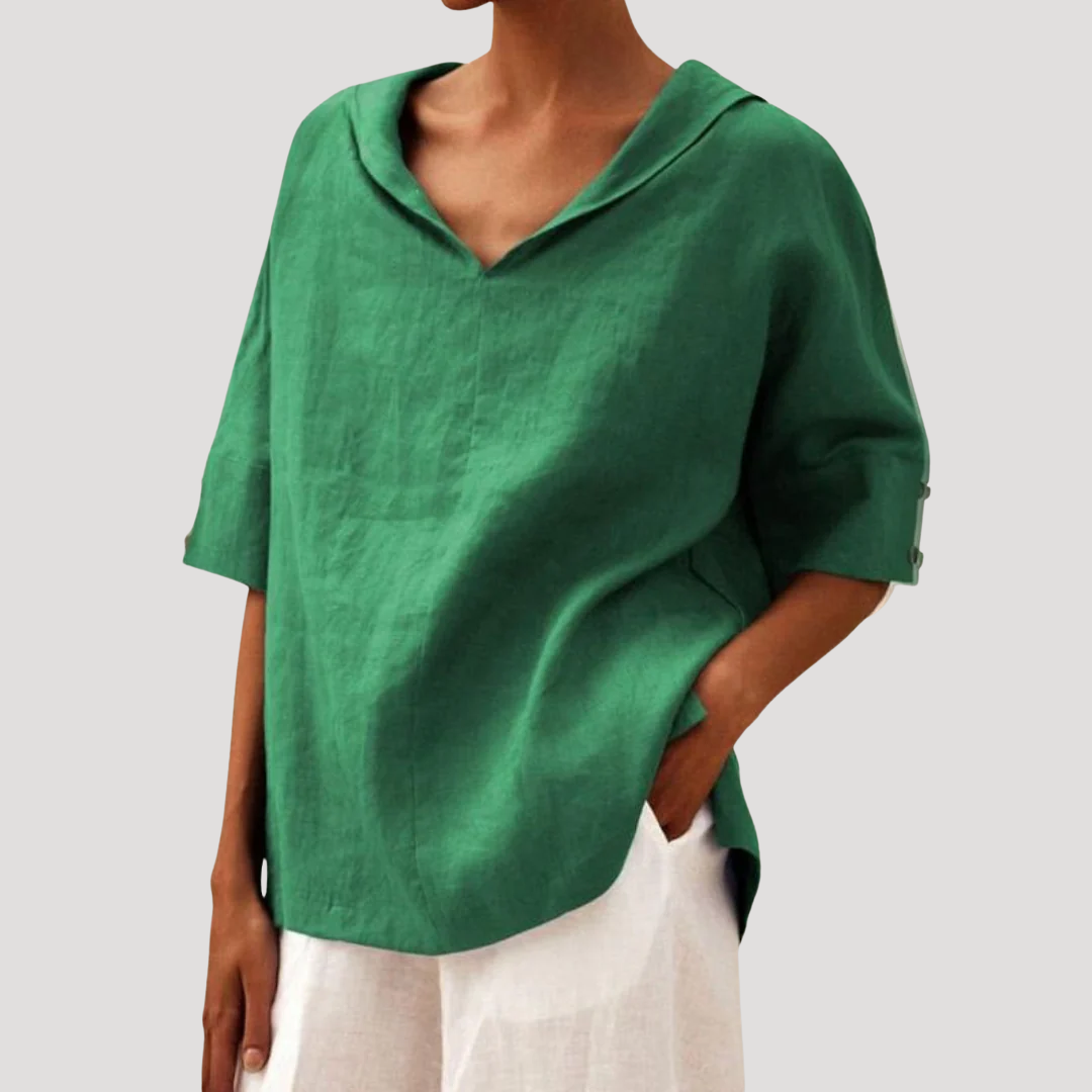 Rela Women's blouse featuring a stylish notch neckline and elegant three-quarter sleeves, perfect for casual and professional wear. 0