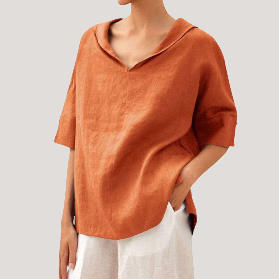 Rela Women's blouse featuring a stylish notch neckline and elegant three-quarter sleeves, perfect for casual and professional wear. 1