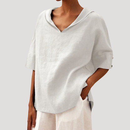 Rela Women's blouse featuring a stylish notch neckline and elegant three-quarter sleeves, perfect for casual and professional wear. 5