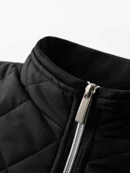 Reuben Men's Quilted Bomber Jacket featuring warm plush lining and a classic design, perfect for stylish comfort in cold weather. 3