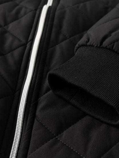 Reuben Men's Quilted Bomber Jacket featuring warm plush lining and a classic design, perfect for stylish comfort in cold weather. 8