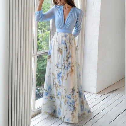 Rita Women’s Maxi Dress featuring a vibrant floral print and a flowing design, perfect for summer outings and special occasions. 1