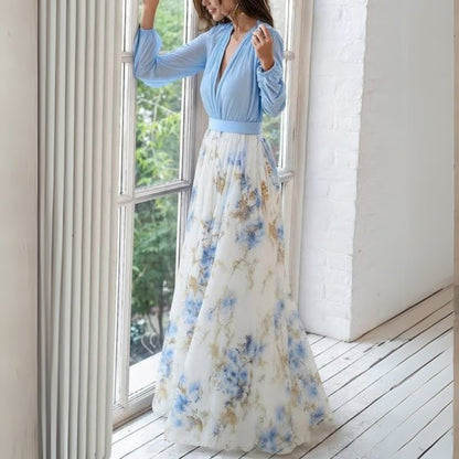 Rita Women’s Maxi Dress featuring a vibrant floral print and a flowing design, perfect for summer outings and special occasions. 2