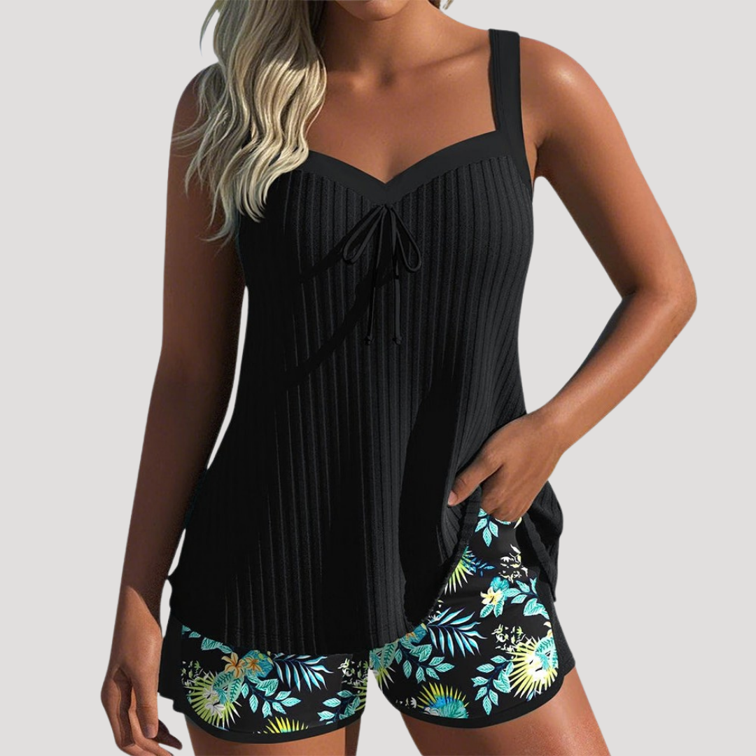 Riva Women’s Tankini Set featuring a flattering sweetheart neckline and stylish printed shorts, perfect for beach days and summer pool outings. 1
