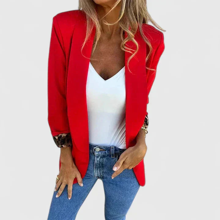 Rosavionne Women’s Blazer featuring a tailored silhouette and reversible leopard lining, perfect for stylish versatility and sophisticated fashion. 2