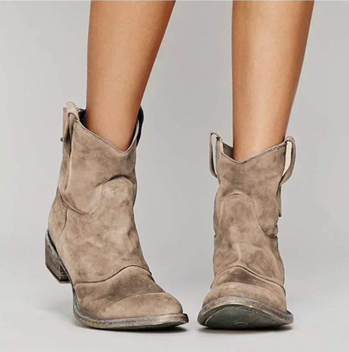 Rosie Women’s Western Boots featuring a stylish suede design and distinctive seams, perfect for adding a touch of western flair to any outfit. 1