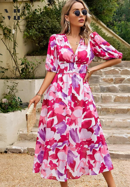 Roxy Women’s Midi Dress featuring a vibrant floral print and stylish puff sleeves, perfect for summer outings and casual gatherings. 10