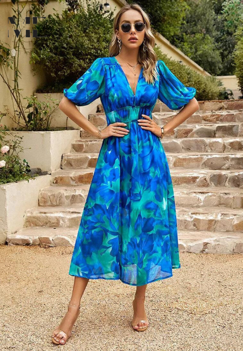 Roxy Women’s Midi Dress featuring a vibrant floral print and stylish puff sleeves, perfect for summer outings and casual gatherings. 6