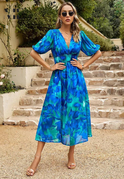 Roxy Women’s Midi Dress featuring a vibrant floral print and stylish puff sleeves, perfect for summer outings and casual gatherings. 6