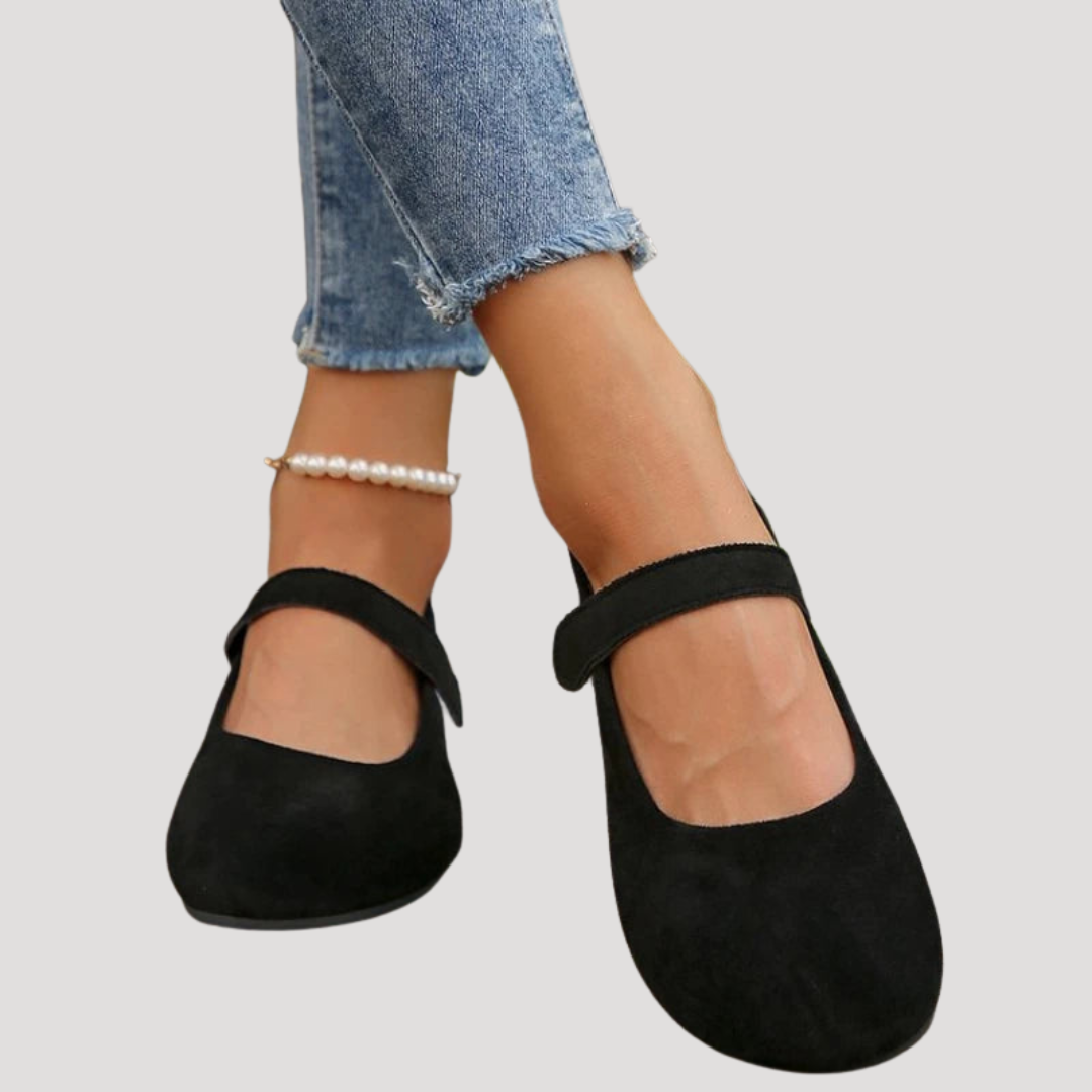 Sera Women’s Mary Jane Flats featuring a soft suede finish and a secure strap for comfortable and stylish everyday wear. 1