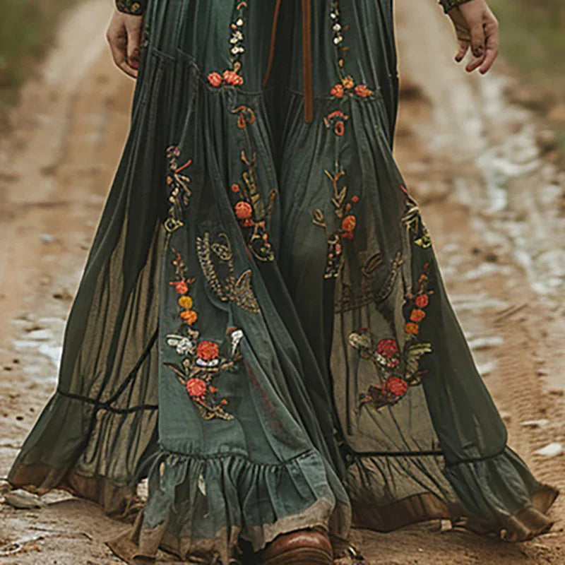 Sera Women’s Maxi Dress featuring a vibrant floral print and elegant pleated design, perfect for summer outings and special occasions. 2