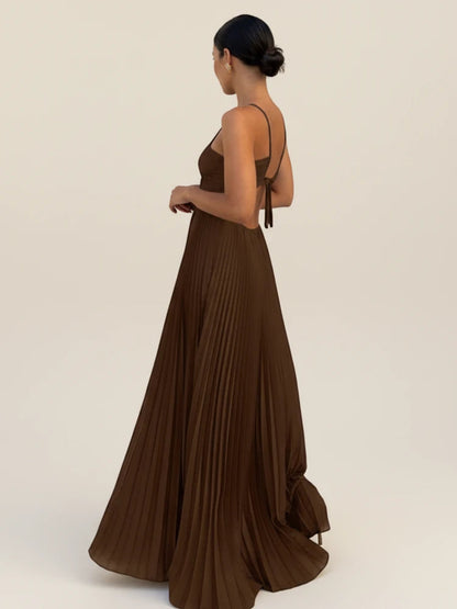 Sera Women's Maxi Dress featuring a strappy halter neckline and elegant pleated A-line design, perfect for summer occasions and casual outings. 1