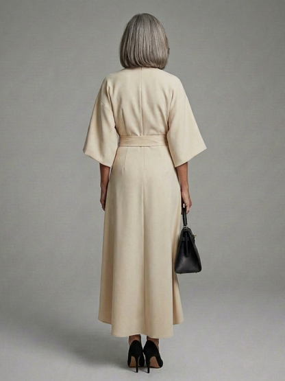 Sereia Women’s Midi Dress featuring a stylish waist band and elegant cape sleeves, perfect for sophisticated occasions. 6