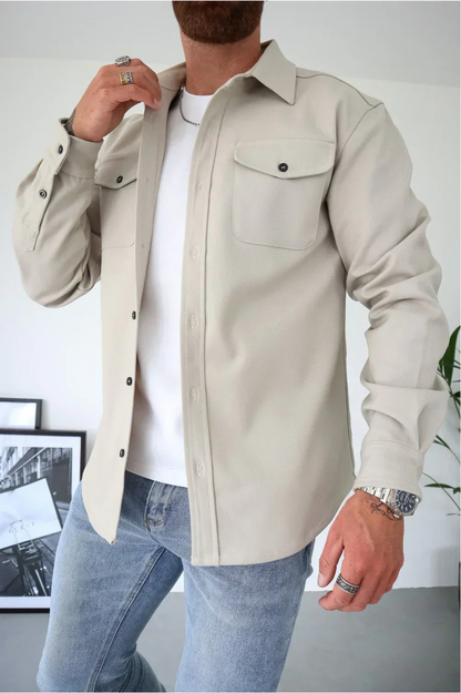 Sleek men's shirt jacket featuring a stylish button-up design and a convenient chest pocket, perfect for casual or semi-formal occasions. 7