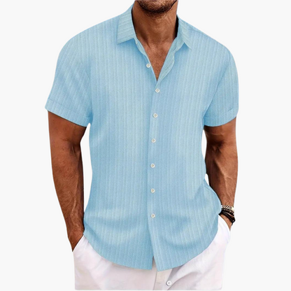 Sleek men's shirt featuring a stylish striped pattern and a classic button-up design, perfect for formal or casual occasions. 0