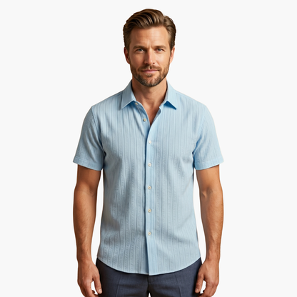 Sleek men's shirt featuring a stylish striped pattern and a classic button-up design, perfect for formal or casual occasions. 2