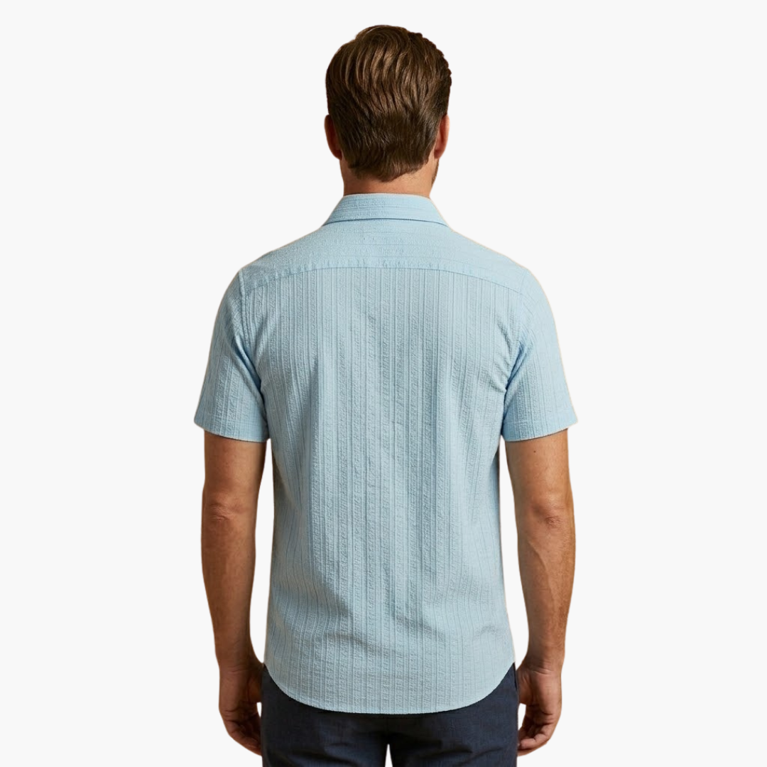 Sleek men's shirt featuring a stylish striped pattern and a classic button-up design, perfect for formal or casual occasions. 6